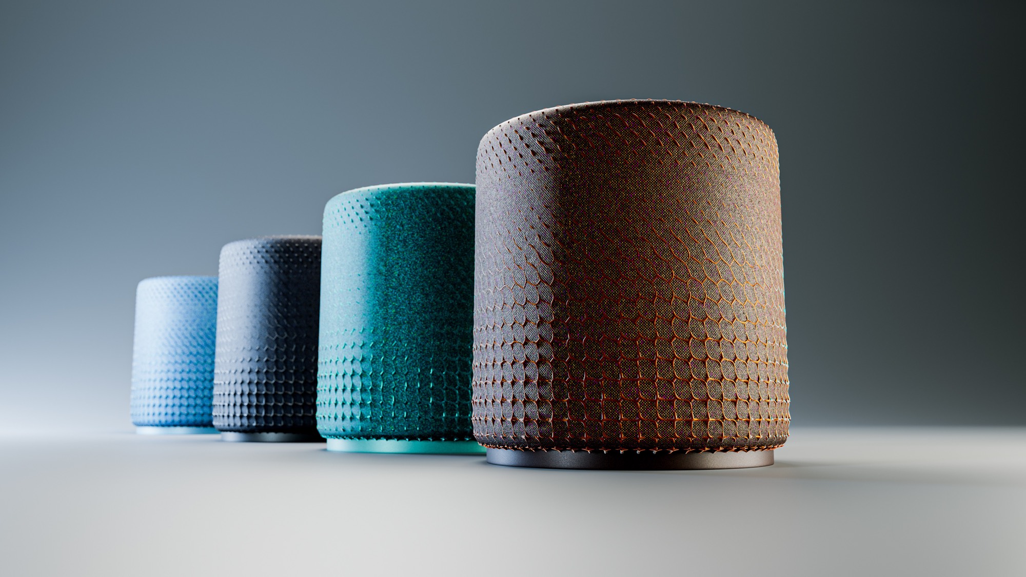Four ARC speakers receding in a row — pale blue, grey, teal and bronze — against a soft graduated backdrop