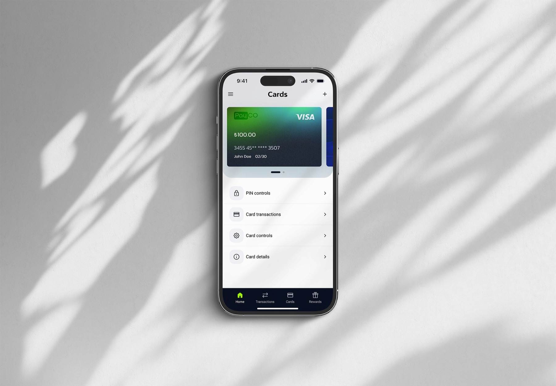 The redesigned PayCO cards screen — clean layout with green accents and card controls