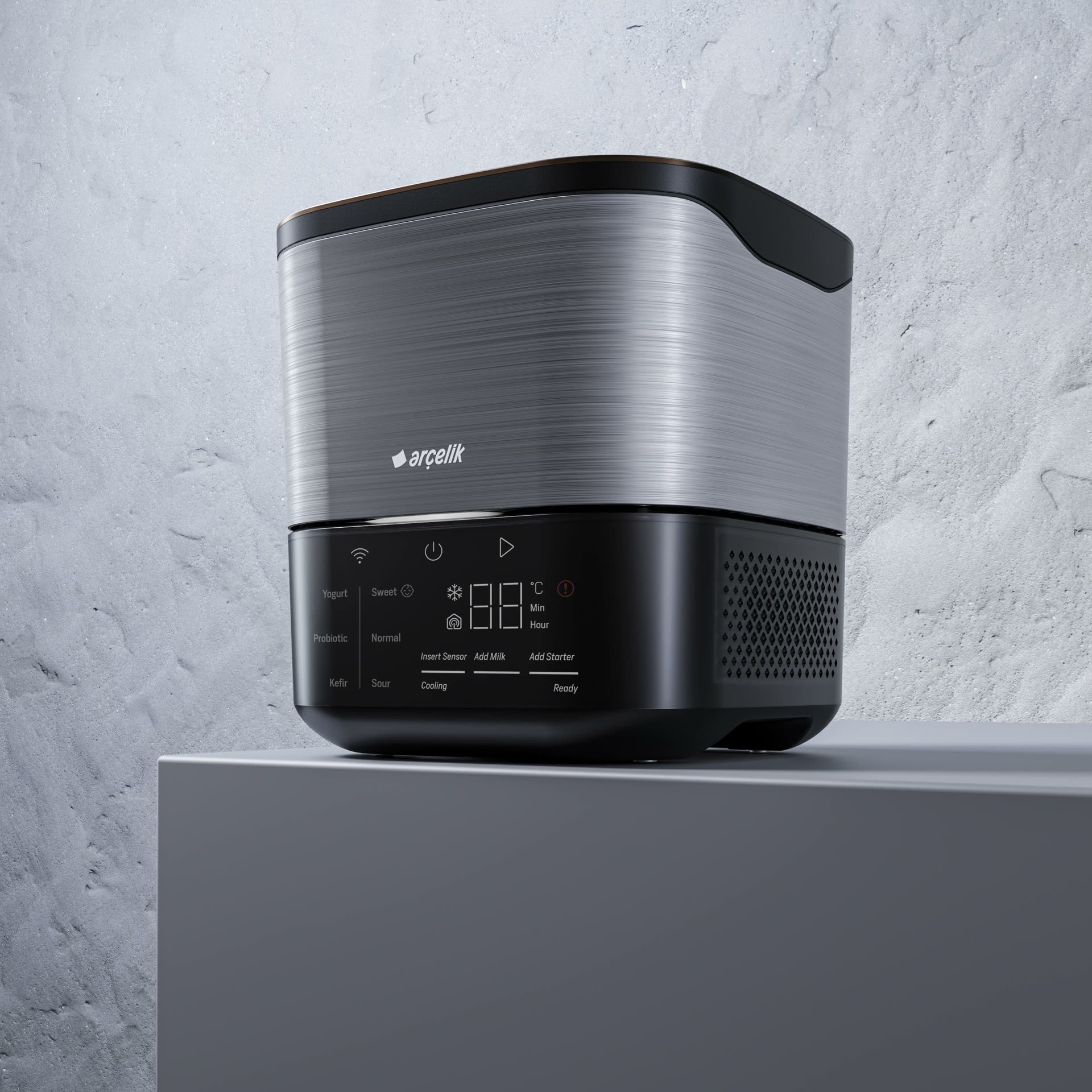 The Beko Gourmet Yogurt Maker on a plinth against a textured concrete wall, its control panel showing the Yogurt, Probiotic and Kefir programmes, the Sweet, Normal and Sour taste settings, and the Insert Sensor, Add Milk and Add Starter steps